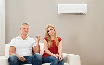 Homeowners enjoying climate comfort in a living room